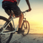 pilates-for-bikers Close-up of a biker on the beach, sundown